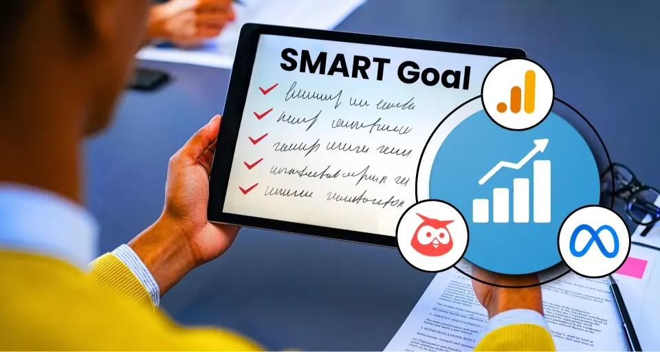 Person holding a tablet with "SMART Goal" and checked items next to icons of a graph, doc, logo.